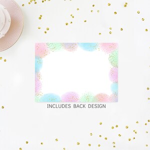 May include: A blank card with a pastel colored confetti border. The card is surrounded by gold confetti on a white background. The text "INCLUDES BACK DESIGN" is printed at the bottom of the card.