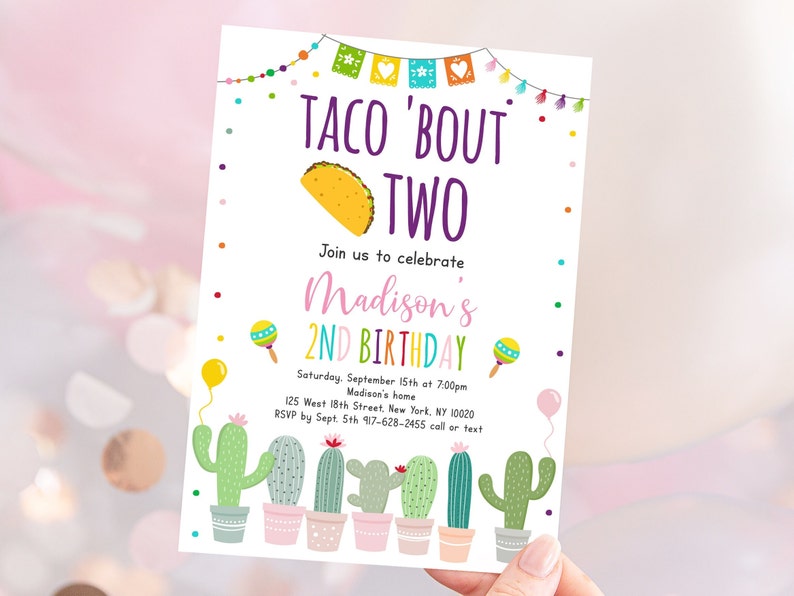 May include: A colorful invitation for a second birthday party with a taco theme. The invitation features a cartoon taco, maracas, and cacti. The text on the invitation reads "Taco 'Bout Two" and "Join us to celebrate Madison's 2nd Birthday".