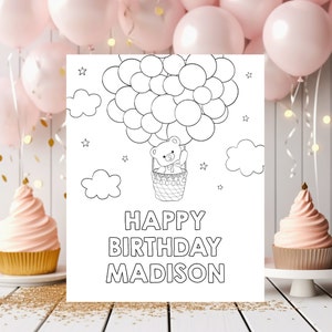 May include: Black and white coloring page featuring a teddy bear in a hot air balloon with the text "Happy Birthday Madison".