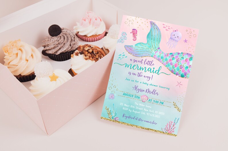 May include: A baby shower invitation with a mermaid tail design in shades of pink, purple, and teal with gold glitter accents. The text reads "a sweet little mermaid is on the way!" and includes details for the event, such as the date, time, and location.