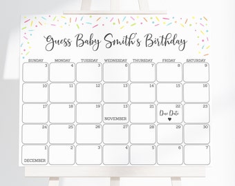 May include: A white calendar with a colorful confetti border. The calendar is for November and December and has the text "Guess Baby Smith's Birthday" at the top. The due date is marked on the calendar with a heart.