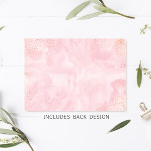 May include: Pink watercolor background with gold glitter. The text "INCLUDES BACK DESIGN" is printed at the bottom of the image.