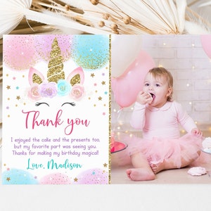 May include: A pink and blue unicorn thank you card with gold glitter accents. The card features a unicorn with a gold horn and a floral crown. The text on the card reads "Thank you. I enjoyed the cake and the presents too, but my favourite part was seeing you. Thanks for making my birthday magical! Love, Madison."