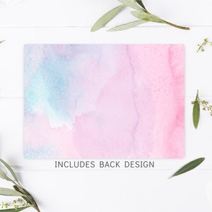 May include: A watercolour background with shades of pink and blue. The text "INCLUDES BACK DESIGN" is printed at the bottom of the image.
