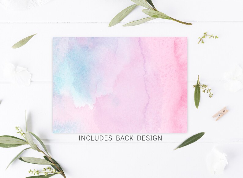 May include: A watercolour background with shades of pink and blue. The text "INCLUDES BACK DESIGN" is printed at the bottom of the image.