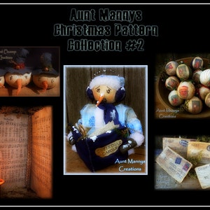 Op de afbeelding: Een verzameling kerstpatronen met een sneeuwpop die een boek met kerstliederen vasthoudt, een kom met ornamenten en drie sneeuwpoppen met blauwe hoeden. De tekst "Aunt Mannys Christmas Pattern Collection #2" staat bovenaan de afbeelding.