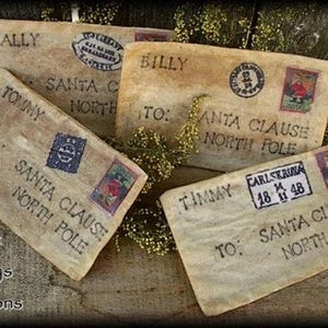 Primitive Vintage-Stil-Buchstaben an Santa-Muster