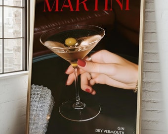 May include: A framed wall art print featuring a martini glass with an olive, set against a dark background. The text MARTINI appears in large red letters at the top, with GIN, DRY VERMOUTH, and OLIVES printed in white at the bottom right corner.