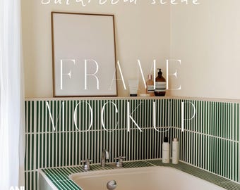 May include: A white frame mockup in a bathroom setting. The frame is on a shelf above a white bathtub with green tile. The text "FRAME MOCKUP" is written in white on the tile.