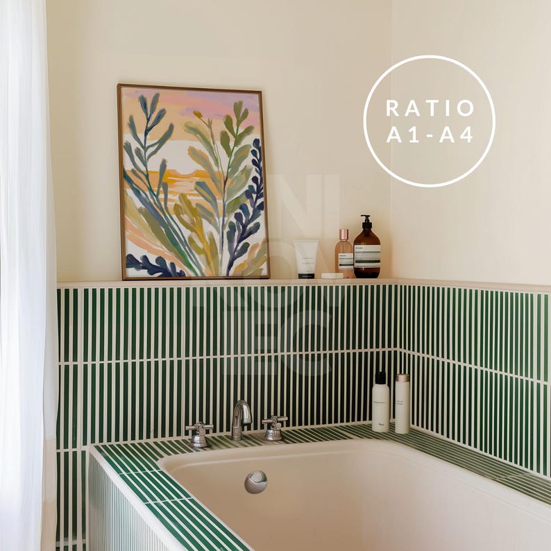 May include: A white bathtub with green tile surround. A framed painting of a floral design hangs above the tub. Bottles of toiletries are on a shelf above the tub.