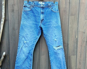 Waist 35, measured. Vintage LEVI'S 517 Jeans, Boot Cut.  Distressed.  Tag 36 x 34.