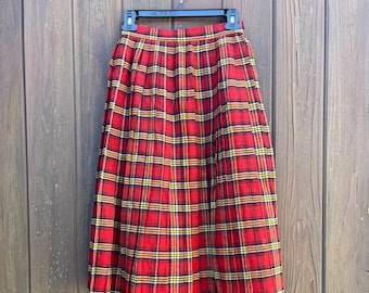 jupe à carreaux en laine rouge vintage des années 60 et 70 avec plis plats. Taille XS.
