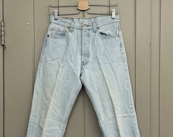 Waist 28 x 29 measured. Vintage VTG Levis 501 Jeans Light Wash. Tag 30 x 34.