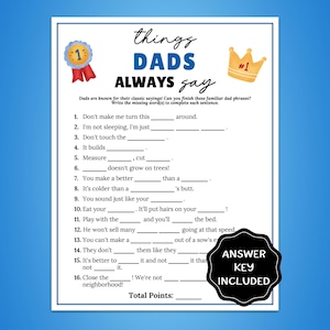 May include: A white game sheet with the text "Things DADS Always Say" and fill-in-the-blank phrases. Includes a gold crown and a ribbon graphic. The answer key is included. The background is blue.