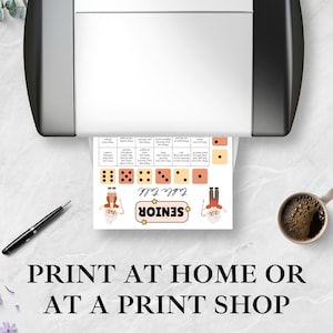 May include: A printed game sheet with dice illustrations and the words "Table Talk Senior" is shown emerging from a printer. A pen and a cup of coffee are on the table. The text "PRINT AT HOME OR AT A PRINT SHOP" is at the bottom.
