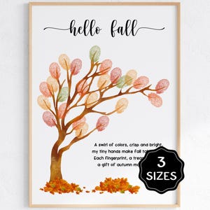 Puede incluir: Impresión enmarcada con la frase "hello fall" sobre una ilustración de un árbol. El árbol tiene huellas dactilares en forma de hojas coloridas en tonos de rojo, naranja y verde. La impresión incluye el texto "3 TAMAÑOS".