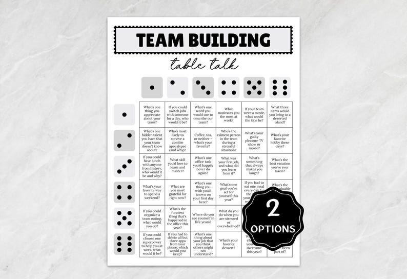 K&ouml;nnte beinhalten: Ein schwarz-wei&szlig; Team-Building-Spiel mit W&uuml;rfeln und Diskussionsanregungen. Der Text "TEAM BUILDING table talk" steht oben. Das Spiel enth&auml;lt Fragen wie "Was sch&auml;tzt du an deinem Team?" und "Was ist dein Lieblingshobby?"