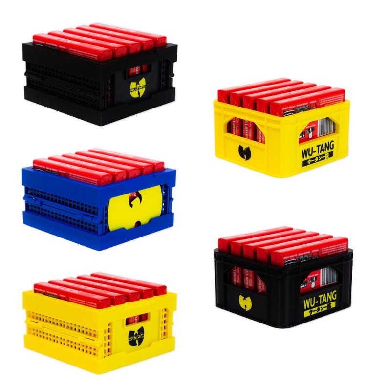May include: Four different colored crates with the Wu-Tang Clan logo. Each crate is filled with red cassette tapes. The crates are black, blue, yellow, and red.