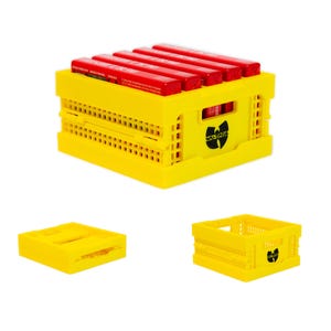 May include: Yellow plastic crate with the Wu-Tang Clan logo. The crate is filled with red and yellow boxes.