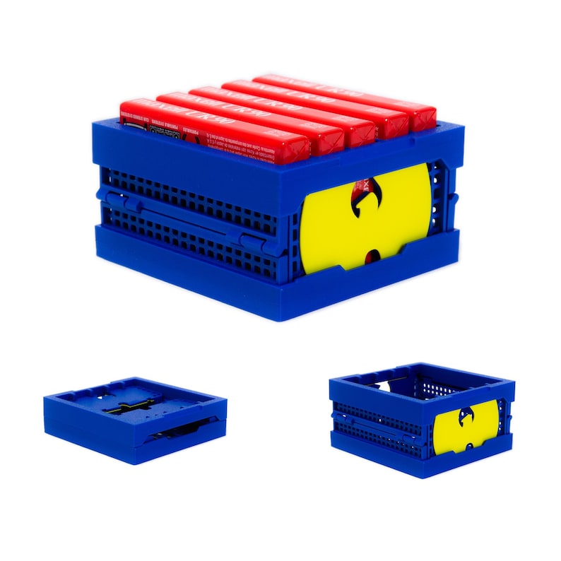 May include: A blue plastic folding crate with a yellow Wu-Tang Clan logo on the front. The crate is filled with red and white candy bars.