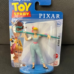 May include: A set of three ceramic mugs with a speckled, matte finish. The mugs are in shades of cream, light gray, and dark gray. Each mug has a simple, minimalist design, perfect for coffee or tea.