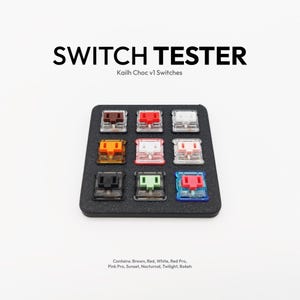 Peut inclure: Un testeur d'interrupteurs noir avec neuf interrupteurs Kailh Choc v1 de différentes couleurs, dont marron, rouge et blanc. Le texte "SWITCH TESTER" est affiché au-dessus des interrupteurs, avec "Kailh Choc v1 Switches" en dessous. Le bas de l'image répertorie les couleurs des interrupteurs.