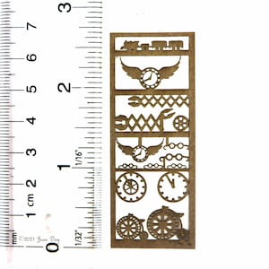 May include: A brown wooden cutout of a steampunk-themed design with gears, clocks, and wings. The cutout is approximately 2 inches tall and 1 inch wide.