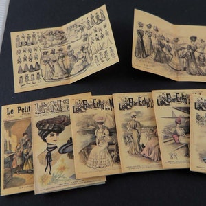 May include: A collection of vintage French fashion magazines, including "Le Petit Echo de la Mode" and "La Mode Illustree". The magazines feature illustrations of women's clothing and accessories from the early 20th century.