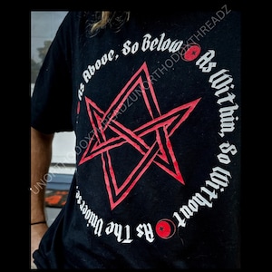 May include: Black t-shirt with a red pentagram and white text that reads "As Above, So Below" and "As Within, So Without As The Unin"