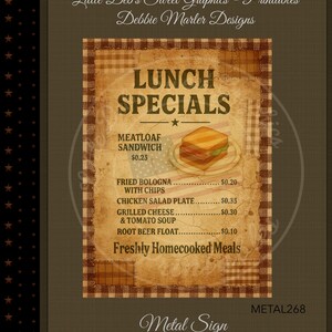 May include: A vintage-style metal sign with a brown and tan patchwork design. The sign features the text "LUNCH SPECIALS" and a list of meal options, including a meatloaf sandwich and root beer float. The sign also includes the text "Freshly Homecooked Meals."