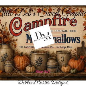 May include: A rectangular sign featuring the text Little Deb's Sweet Graphics, Campfire Marshmallows, The Original Food, and location details. The design includes autumn leaves, pumpkins, and stoneware crocks on a shelf. Size 5x7 is printed.