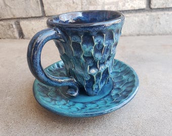 Water textured tea cup and saucer