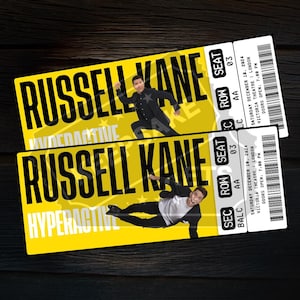 May include: Two yellow and black tickets for a Russell Kane Hyperactive comedy show at the Victoria Theatre in London on Saturday, December 10, 2024. The tickets are for seats in the balcony section, row AA, seat 03.