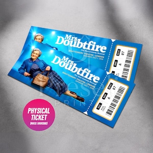 May include: Two blue "Mrs. Doubtfire" musical tickets. The tickets feature an image of the character and the text "Shaftesbury Theatre, London, Saturday July 1, 2026". A pink circle reads "Physical Ticket (Mock Souvenir)".