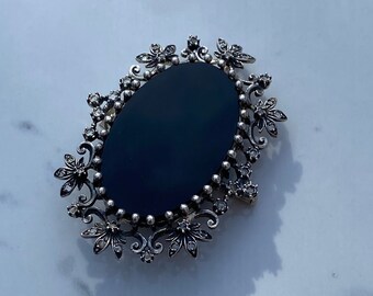 C. 1940 Sterling Silver Onyx and Diamond Brooch (2.25")