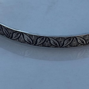 May include: A rustic wooden sign with the text "Welcome to our home" in a handwritten style. The sign features a distressed finish and a simple, inviting design, perfect for a front porch or entryway.