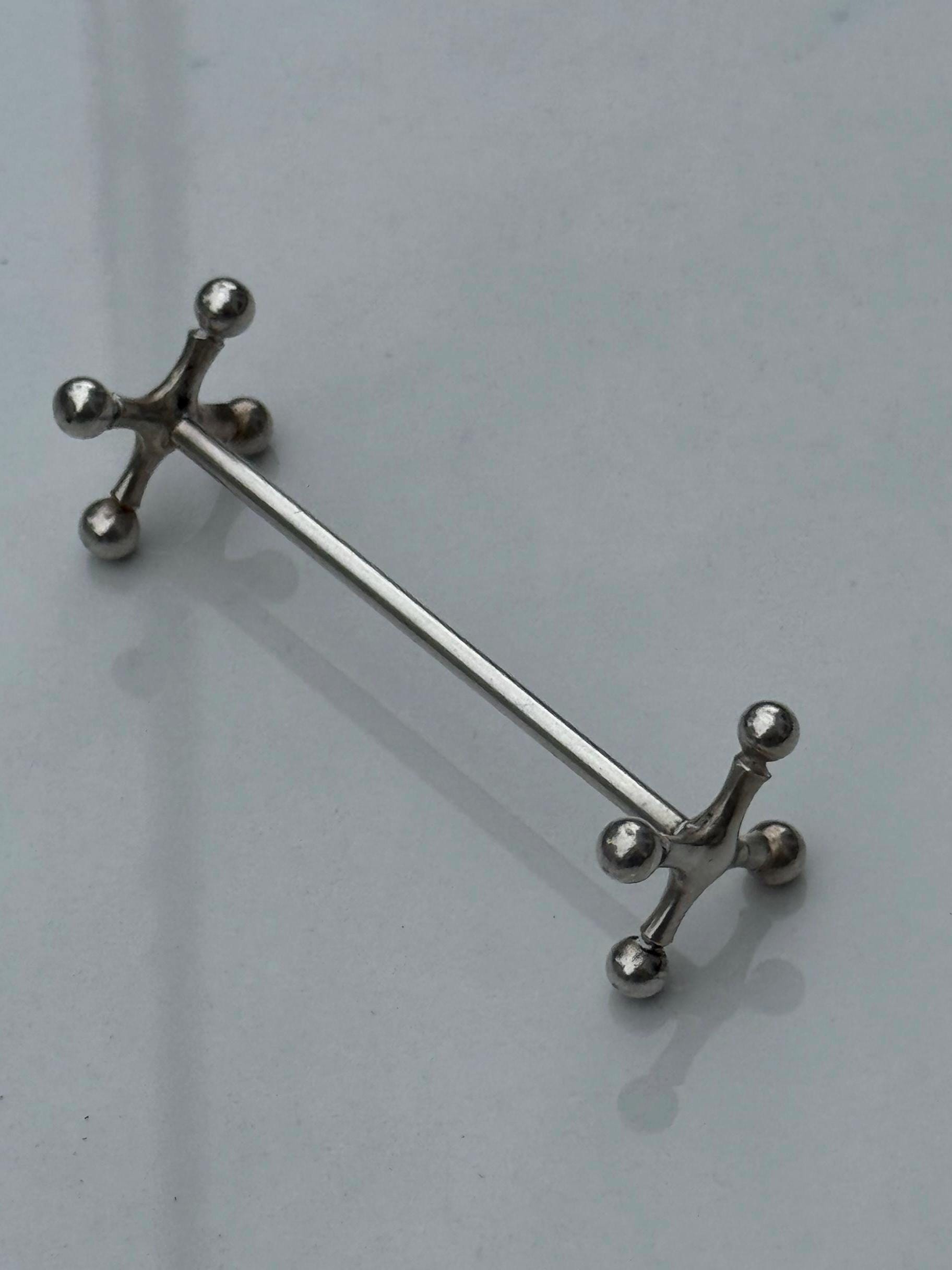 Französisches Kugelmotiv-Restmesser - Versilbert