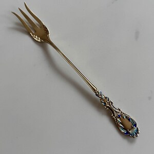 1895 R. Blackington & Co. 'Nautilus' Sterling Silver Gilt and Enamel Long Handle Olive Fork (14 g)