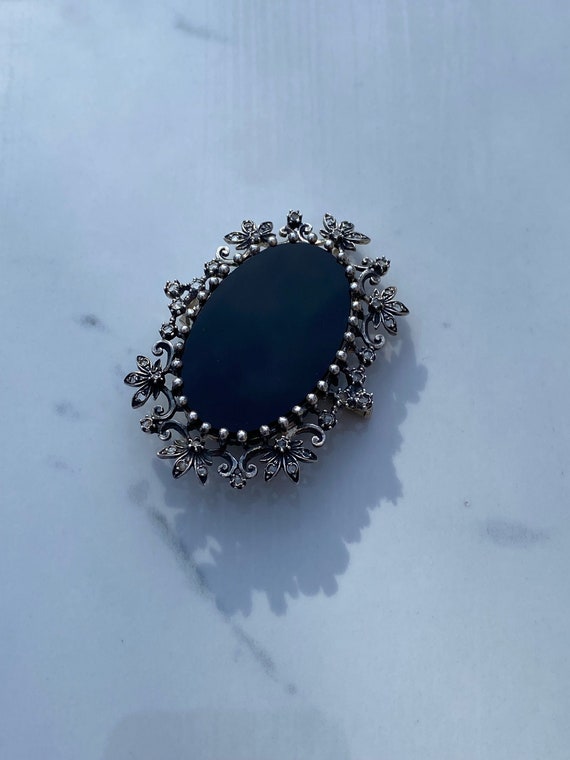 C. 1940 Sterling Silver Onyx and Diamond Brooch (2