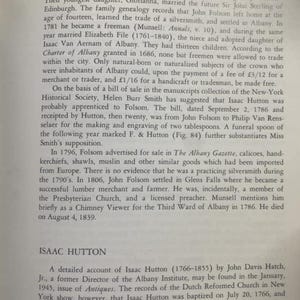 May include: A black and white text page from a book about the history of John Folsom and Isaac Hutton, two silversmiths from Albany, New York. The text describes their lives and careers, including their apprenticeships and the goods they sold.