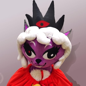 Big plush doll  based on the Cult of the Lamb game.