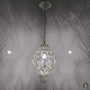 Elegant Silver-Toned Blown Glass Pendant Lamp, Handcrafted for Unique and Sophisticated Lighting Solutions