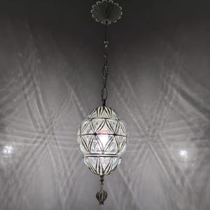 Artisan Crafted Blown Glass Single Pendant with a Stunning Silver Hue, Perfect for Enhancing Contemporary Spaces