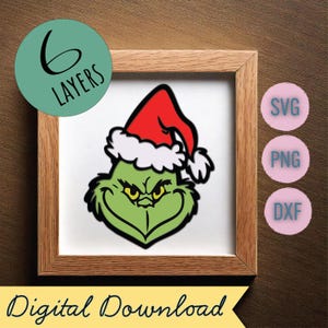 May include: A green Grinch character wearing a red Santa hat with white trim. The Grinch is smiling with a mischievous expression. The image is a digital download available in SVG, PNG, and DXF formats.