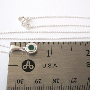 The petite pendant and bail are 5/8 inch long x 5/16 inch across the setting.