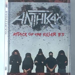 May include: Anthrax "Attack of the Killer B's" cassette tape. The album cover features the band's logo above the title, with a snowy background. Below, five figures in black stand in a row.