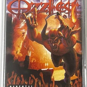 May include: A cassette tape with the album art for Ozzfest. The cover features a demonic figure with horns and a fiery background. The text "PARENTAL ADVISORY EXPLICIT CONTENT" is visible.