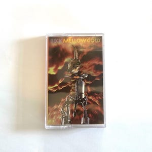 ③ Beck「Odelay」カセットテープ Cassette Tape LP il_1080xN.4552893482_oc4l.jpg