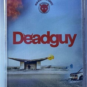 May include: A cassette tape with a surreal landscape scene. The cover features the word "Deadguy" in red, with a logo that says "Near Death Travel Services." A building with a flat roof and a car on fire are also visible.