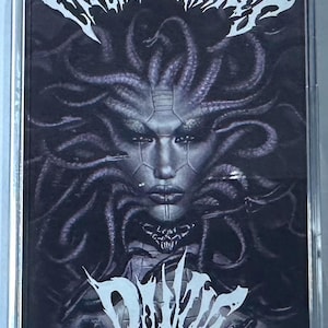 May include: A cassette tape with a dark, gothic design. The cover features a detailed illustration of a woman with snake-like hair, and the band name "CIRCLE of SNAKES" is written in a stylized font.